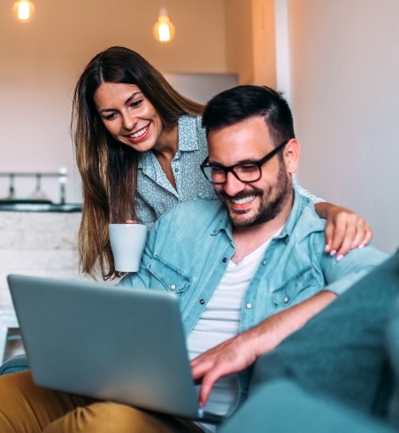 Man and woman deciding if clear and ceramic braces are right for them