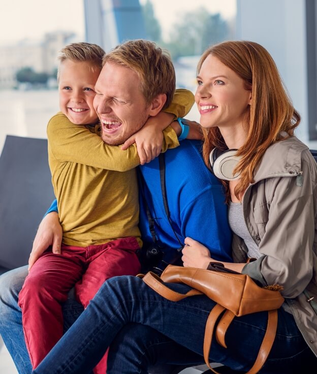 Smiling parents and child