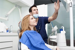 Ludlow orthodontist talking to patient about braces