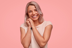a patient with braces smiling